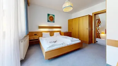 Ein Bett oder Betten in einem Zimmer der Unterkunft Brixana