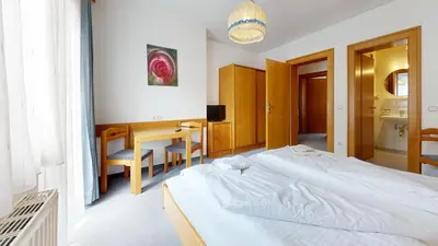 Ein Bett oder Betten in einem Zimmer der Unterkunft Brixana
