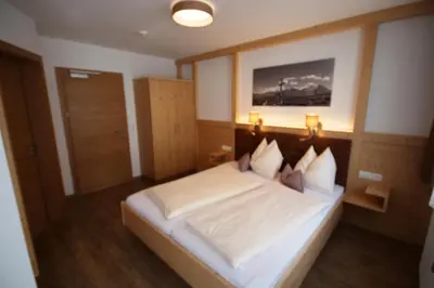 Ein Bett oder Betten in einem Zimmer der Unterkunft Haus Dorfblick