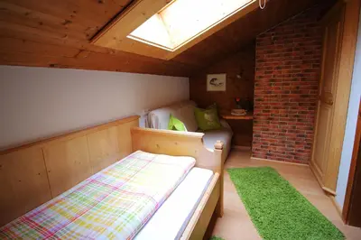 Ein Bett oder Betten in einem Zimmer der Unterkunft Heachhof