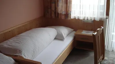 Ein Bett oder Betten in einem Zimmer der Unterkunft Gästehaus Sillaber-Gertraud Nuck