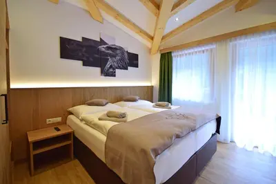 Ein Bett oder Betten in einem Zimmer der Unterkunft Waidmannsruh Appartements