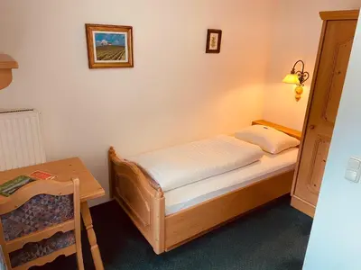 Ein Bett oder Betten in einem Zimmer der Unterkunft Pension Eder - Joker card included in summer