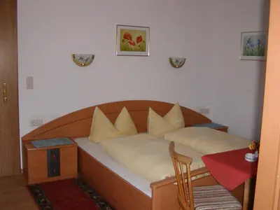 Ein Bett oder Betten in einem Zimmer der Unterkunft Ferienwohnungen Rieser