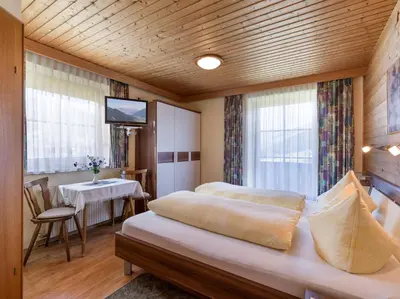 Ein Bett oder Betten in einem Zimmer der Unterkunft Ferienwohnungen Rieser