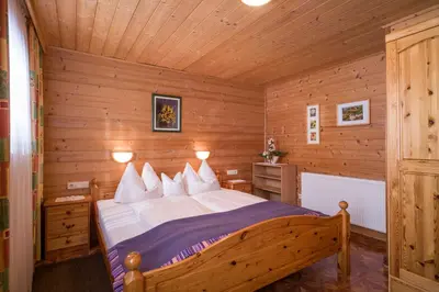 Ein Bett oder Betten in einem Zimmer der Unterkunft Ferienwohnungen Rieder