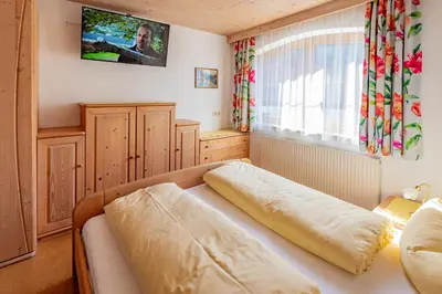 Ein Bett oder Betten in einem Zimmer der Unterkunft Ferienwohnung Ausblick Zillertal