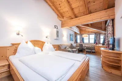 Ein Bett oder Betten in einem Zimmer der Unterkunft Adults Only Boutique-Hotel Unterlechner