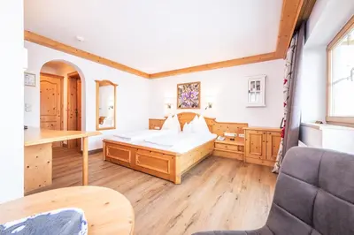 Ein Bett oder Betten in einem Zimmer der Unterkunft Adults Only Boutique-Hotel Unterlechner