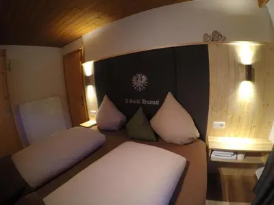 Ein Bett oder Betten in einem Zimmer der Unterkunft Haus Weitenstich