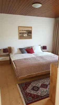 Ein Bett oder Betten in einem Zimmer der Unterkunft Appartement Unterbergblick