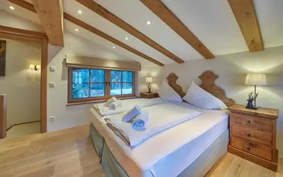 Ein Bett oder Betten in einem Zimmer der Unterkunft Chalet Tannenbaum