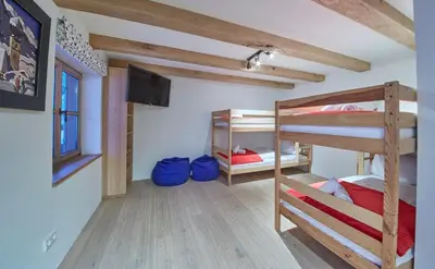 Ein Bett oder Betten in einem Zimmer der Unterkunft Chalet Tannenbaum