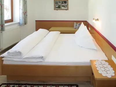 Ein Bett oder Betten in einem Zimmer der Unterkunft Apartment Kraftreich Apartments-4 by Interhome