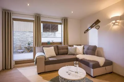 Ein Sitzbereich in der Unterkunft Appartement Heidegger