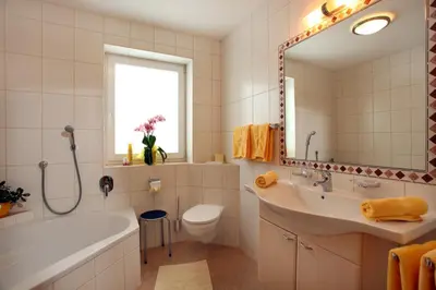 Ein Badezimmer in der Unterkunft Appartements Oberhauser