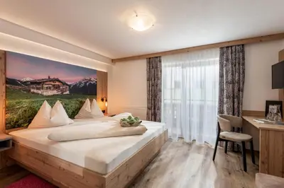 Ein Bett oder Betten in einem Zimmer der Unterkunft Gästehaus Hochstaffl