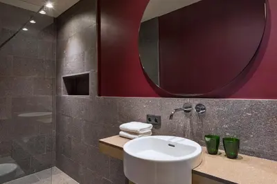 Ein Badezimmer in der Unterkunft Natürlich Hell. Aparthotel & Camping