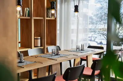 Ein Restaurant oder anderes Speiselokal in der Unterkunft Natürlich Hell. Aparthotel & Camping
