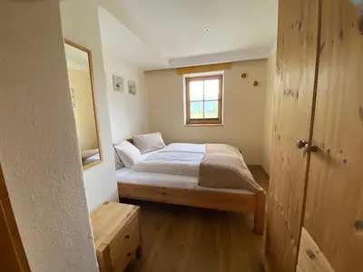 Ein Bett oder Betten in einem Zimmer der Unterkunft Apartments Golfweg