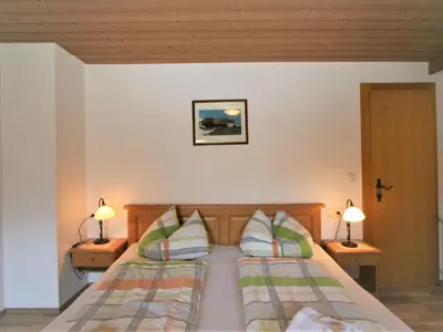 Ein Bett oder Betten in einem Zimmer der Unterkunft Holiday Home Hauser by Interhome