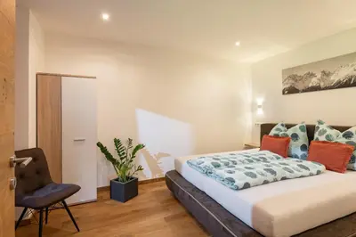 Ein Bett oder Betten in einem Zimmer der Unterkunft AW - Apartment Wilder Kaiser