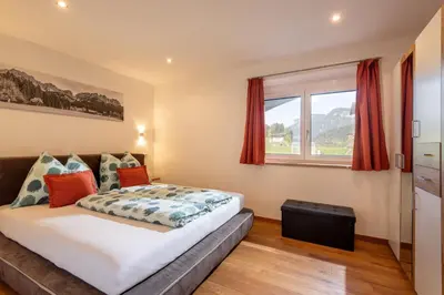 Ein Bett oder Betten in einem Zimmer der Unterkunft AW - Apartment Wilder Kaiser
