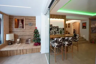 Ein Sitzbereich in der Unterkunft Appartements Alpin