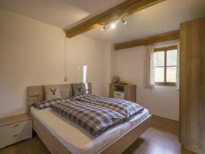 Ein Bett oder Betten in einem Zimmer der Unterkunft Farmhouse in Hopfgarten near Ski Bus
