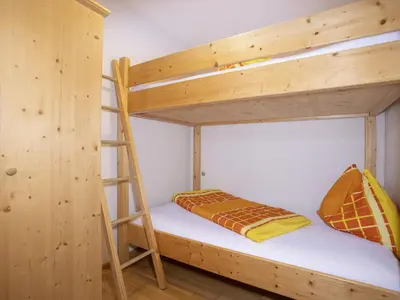 Ein Bett oder Betten in einem Zimmer der Unterkunft Apartment Ferienhof Sonnseitn-2 by Interhome