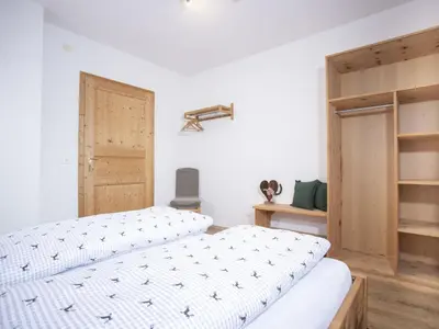 Ein Bett oder Betten in einem Zimmer der Unterkunft Apartment Ferienhof Sonnseitn-2 by Interhome