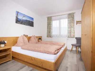 Ein Bett oder Betten in einem Zimmer der Unterkunft Apartment Ferienhof Sonnseitn-2 by Interhome