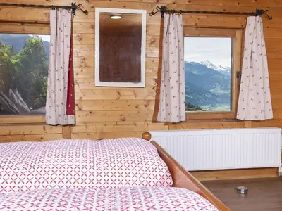 Ein Bett oder Betten in einem Zimmer der Unterkunft Holiday Home Hochzillertalblick by Interhome