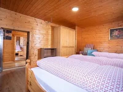 Ein Bett oder Betten in einem Zimmer der Unterkunft Holiday Home Hochzillertalblick by Interhome