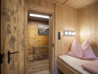 Ein Bett oder Betten in einem Zimmer der Unterkunft Holiday Home Hochzillertalblick by Interhome