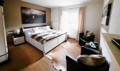 Ein Bett oder Betten in einem Zimmer der Unterkunft Kitzbühel Apartments Haus Brugger