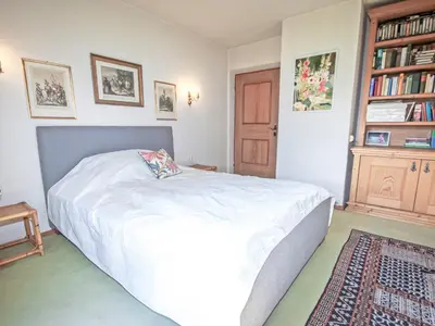Ein Bett oder Betten in einem Zimmer der Unterkunft Chalet Patricia by Interhome