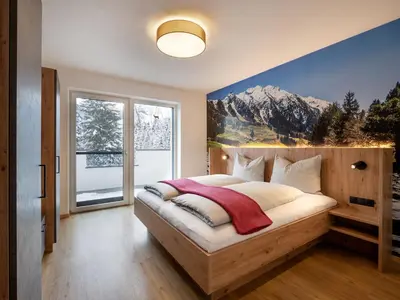 Ein Bett oder Betten in einem Zimmer der Unterkunft Ferienwohnung Klocker