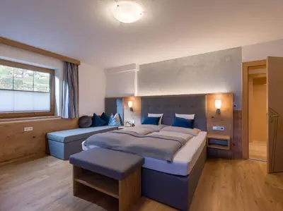 Ein Bett oder Betten in einem Zimmer der Unterkunft Ferienwohnung Garber