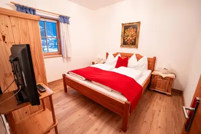 Ein Bett oder Betten in einem Zimmer der Unterkunft Chalet Isabella