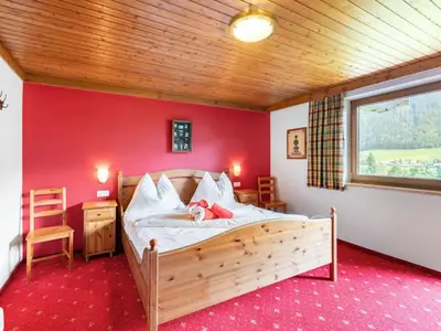 Ein Bett oder Betten in einem Zimmer der Unterkunft Holiday Home Haus am Sonnenhang by Interhome