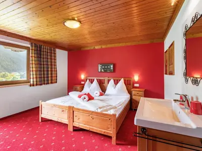 Ein Bett oder Betten in einem Zimmer der Unterkunft Holiday Home Haus am Sonnenhang by Interhome