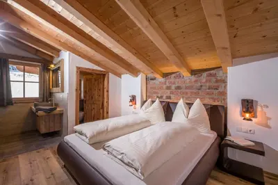 Ein Bett oder Betten in einem Zimmer der Unterkunft Chalet Apartment Obermanzl