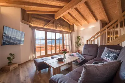 Ein Sitzbereich in der Unterkunft Chalet Apartment Obermanzl