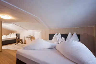 Ein Bett oder Betten in einem Zimmer der Unterkunft Kaiser Chalet