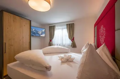 Ein Bett oder Betten in einem Zimmer der Unterkunft Kaiser Chalet