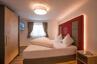 Ein Bett oder Betten in einem Zimmer der Unterkunft Kaiser Chalet