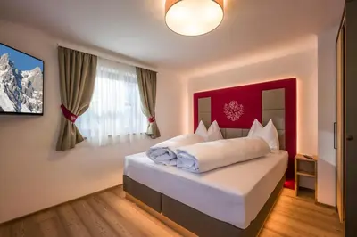 Ein Bett oder Betten in einem Zimmer der Unterkunft Kaiser Chalet