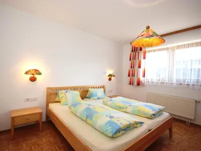 Ein Bett oder Betten in einem Zimmer der Unterkunft Apartment Gasteighof-4 by Interhome