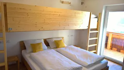 Ein Bett oder Betten in einem Zimmer der Unterkunft Holiday Home Zillertal - Haus Gigl